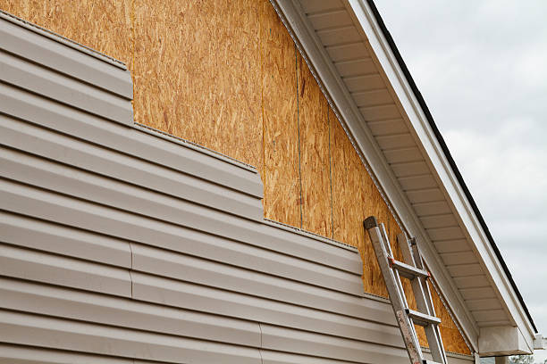 Professional Vinyl Siding technician working in Spring House, PA